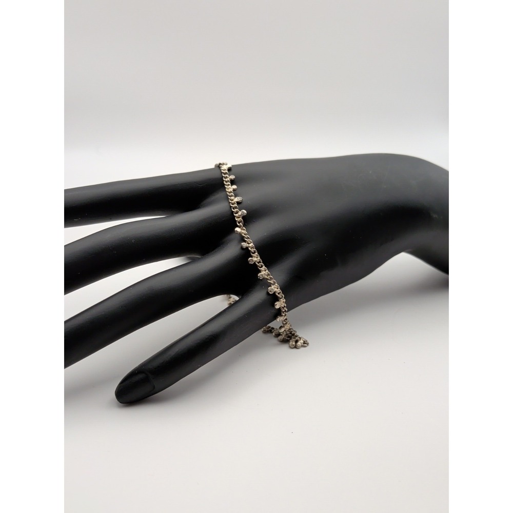 Silver Toned Chain Bracelet With Round Charms